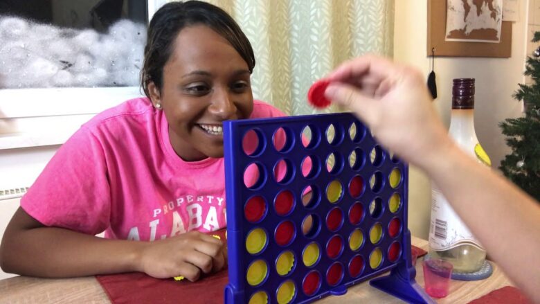 Adults Playing Connect 4